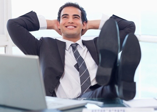 Satisfied businessman relaxing in his office-747491-edited.jpeg Featured Image